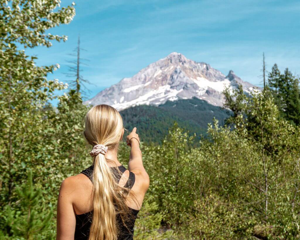 Pointing at Mt Hood National Park.