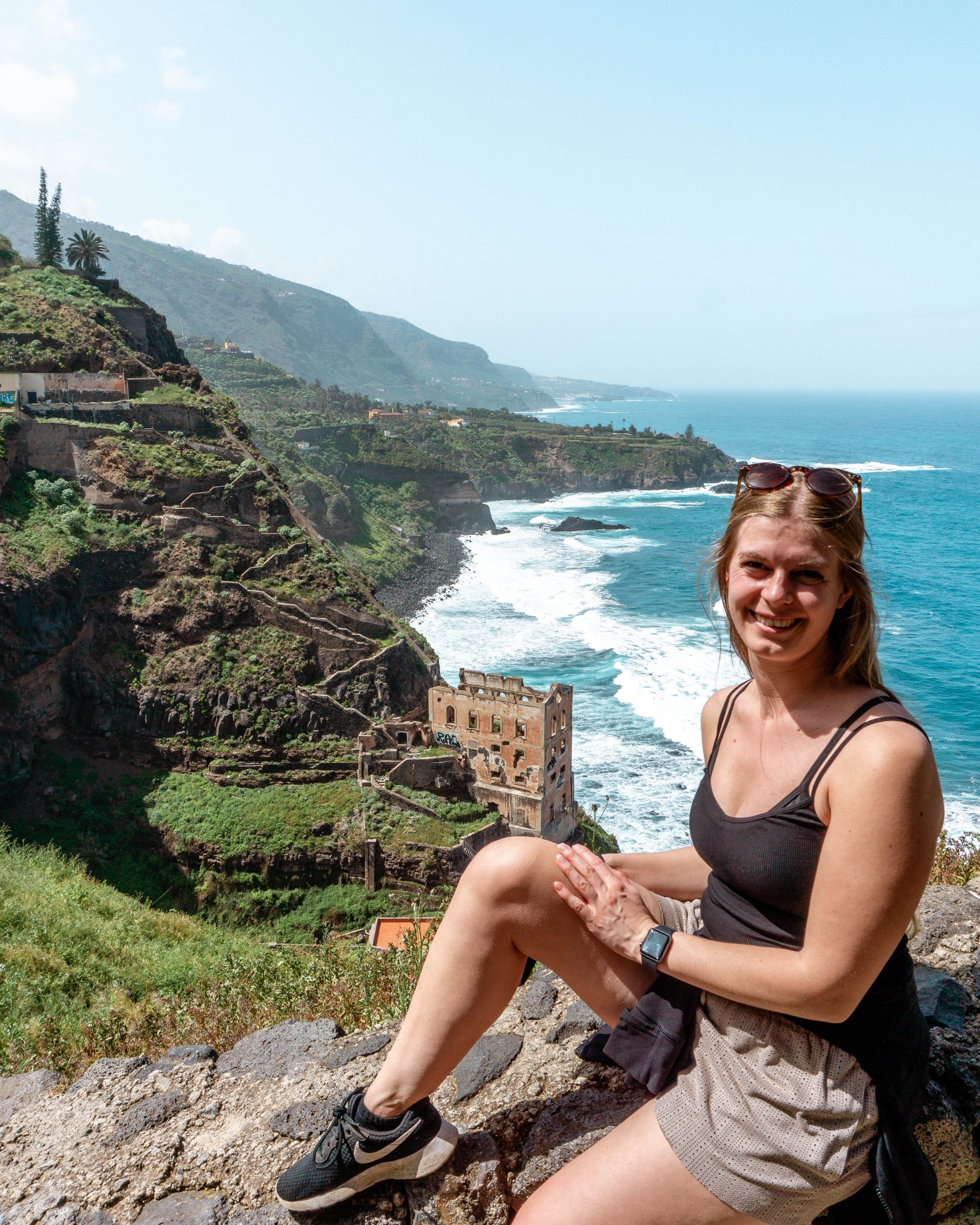 Jo sitting in front of La Gordejuela along the Rambla de Castro.