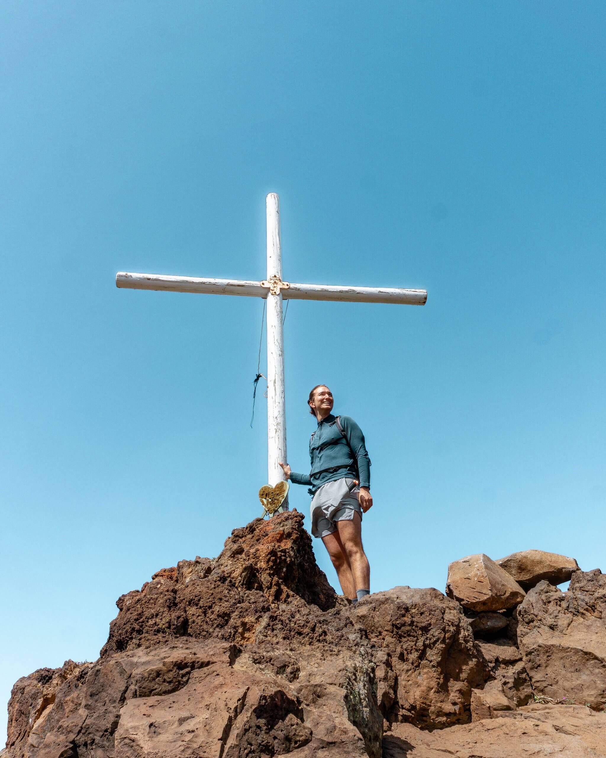 Summit of the Tamaimo-Guama Loop trail with a cross.