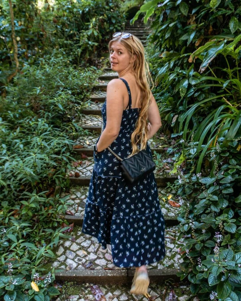 A girl standing in Parque de Liberdade.