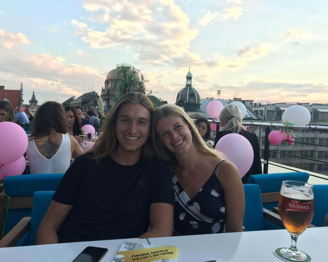 A couple having a drink at Duplex Club and Restaurant in Prague.