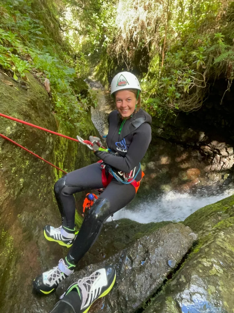 A girl canyoning in Madeira.