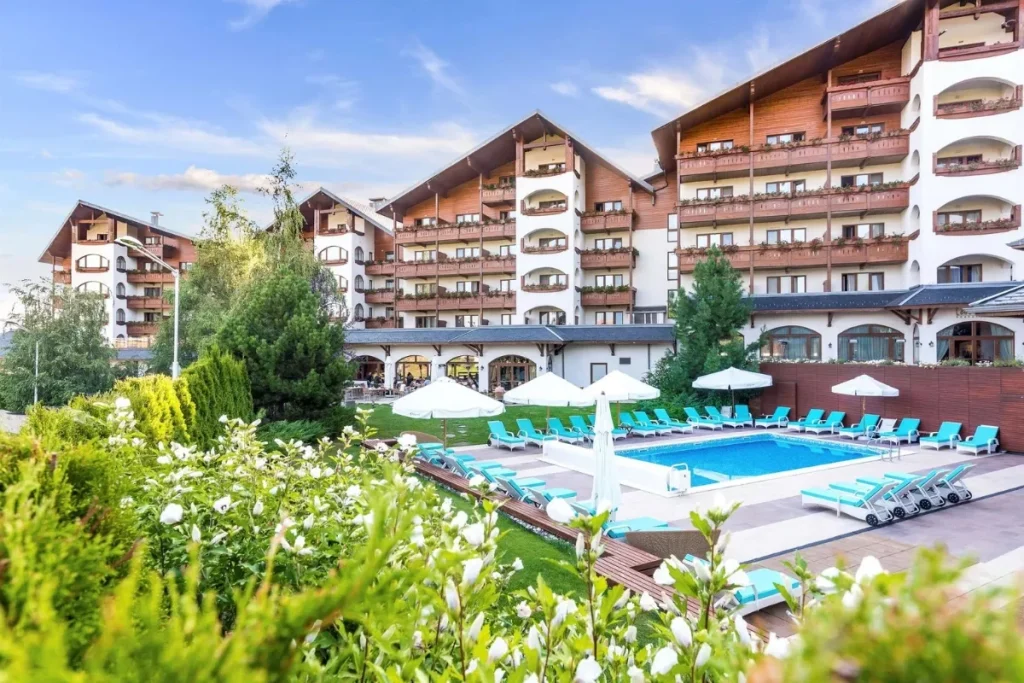 Outdoor pool area at Kempinski Hotel Grand in the mountain town of Bansko.