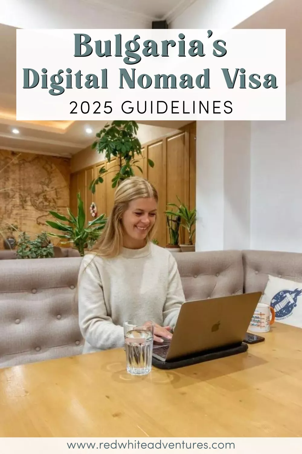 A smiling woman works on a laptop at a coworking space with indoor plants and wooden accents. Text over the image reads “Bulgaria’s Digital Nomad Visa – 2025 Guidelines.”