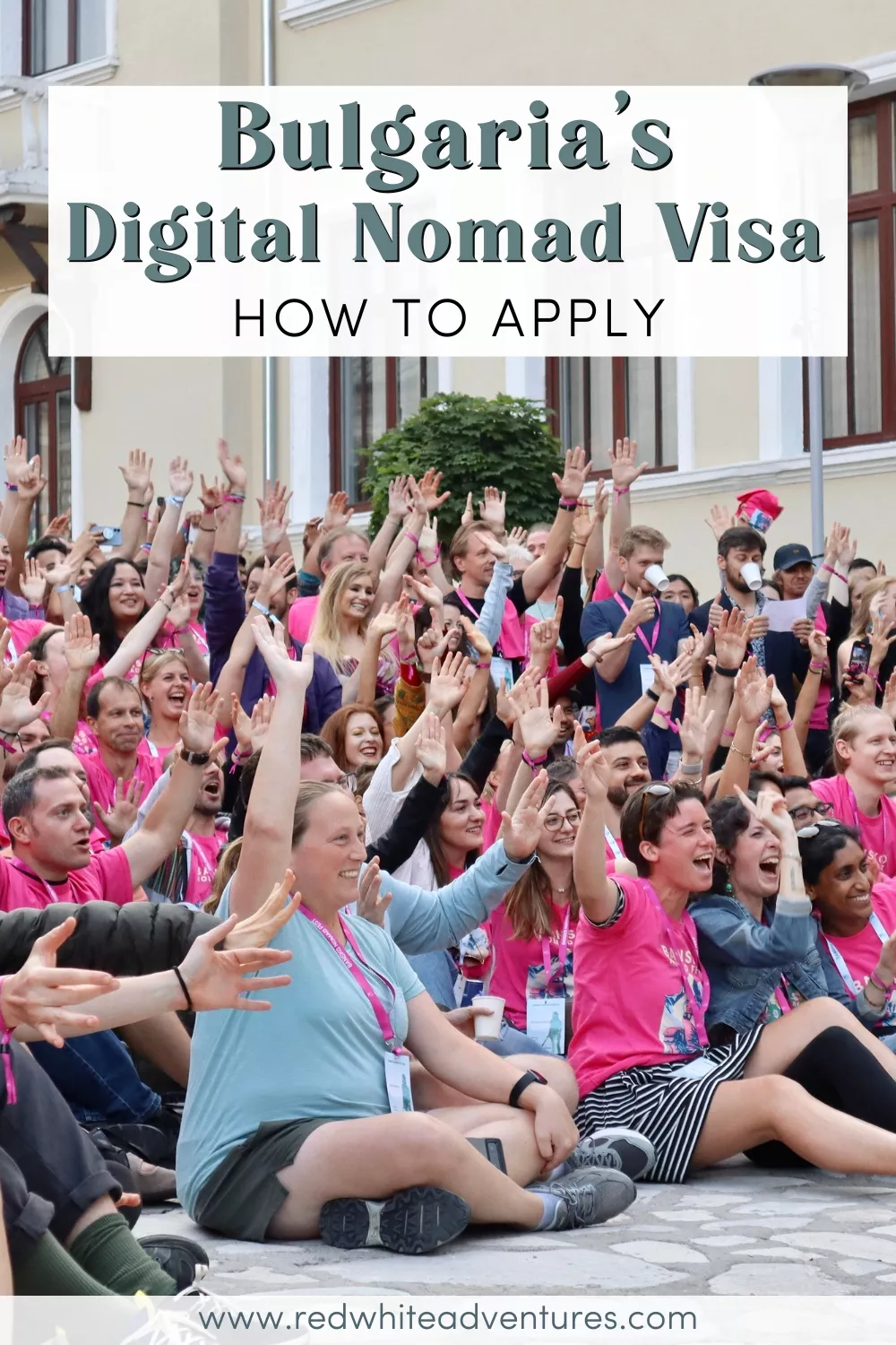A large, cheerful crowd of digital nomads in colorful clothing gathers in Bansko, raising their hands in celebration. The text overlay says “Bulgaria’s Digital Nomad Visa – How to Apply.”