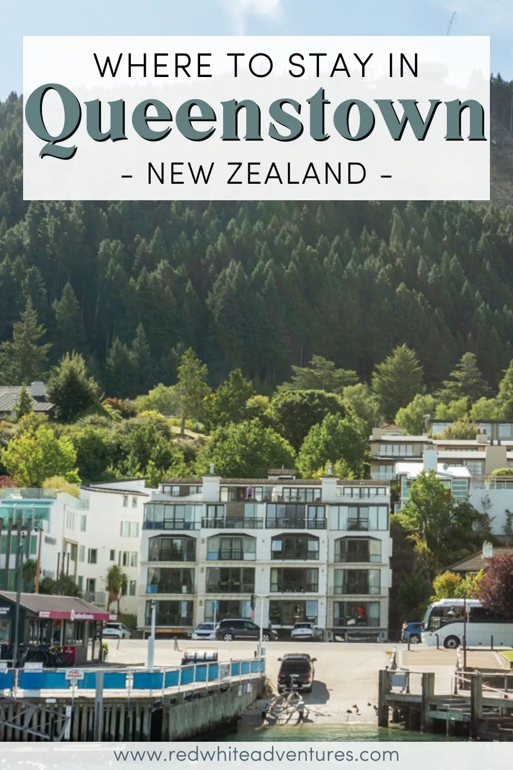 Pinterest graphic titled ‘Where to Stay in Queenstown – New Zealand’ placed over a scenic photo of a waterfront hotel in Queenstown. The modern white buildings face Lake Wakatipu, backed by a steep hillside covered in dense green forest.