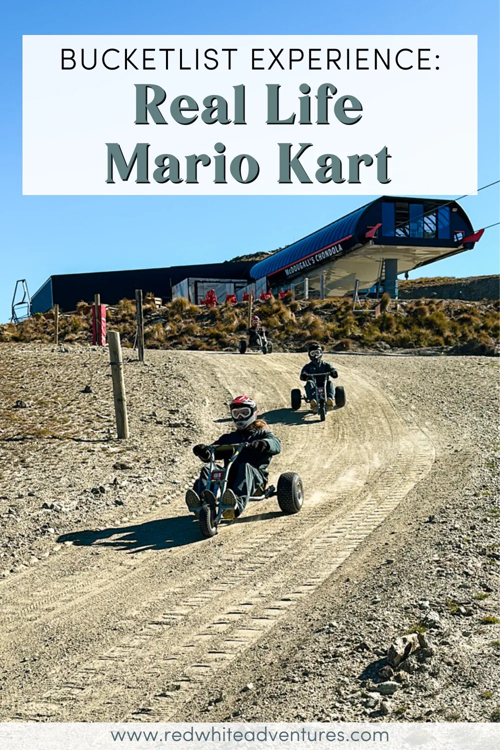 Riders wearing helmets race downhill on mountain carts near a gondola station at an alpine resort in New Zealand. The dusty trail and lift infrastructure highlight this bucket-list outdoor adventure.