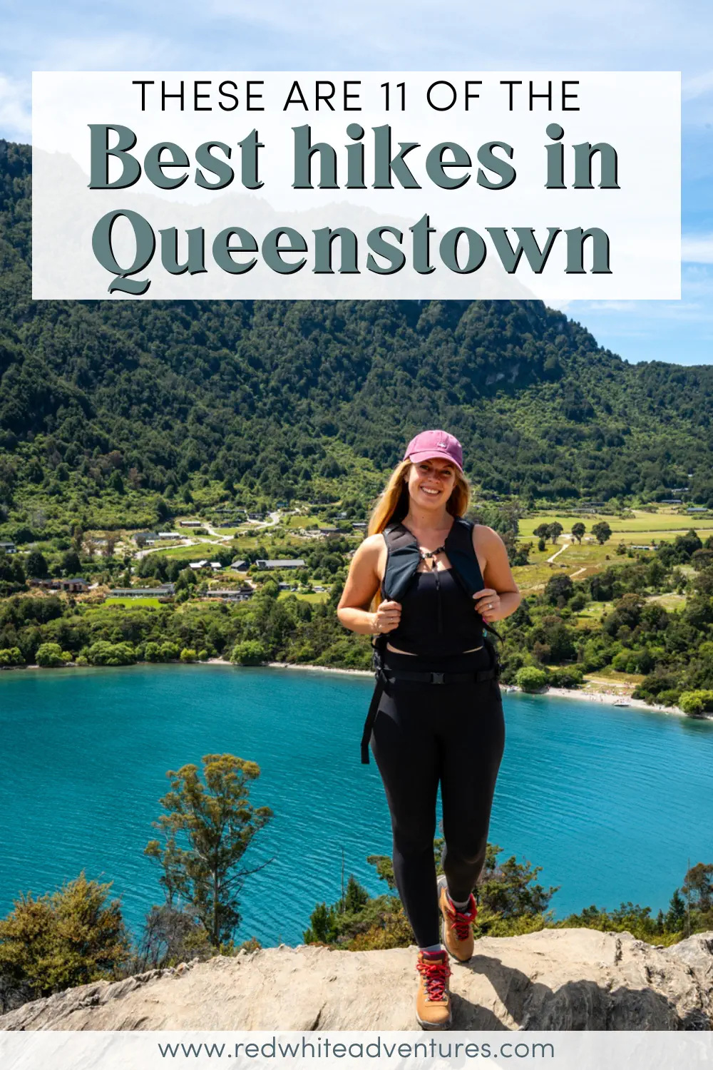 A woman stands on a cliff above a bright blue lake with forested hills behind her, with text that reads, “These are 11 of the best hikes in Queenstown.” The image showcases popular hiking views overlooking the lake and surrounding countryside.