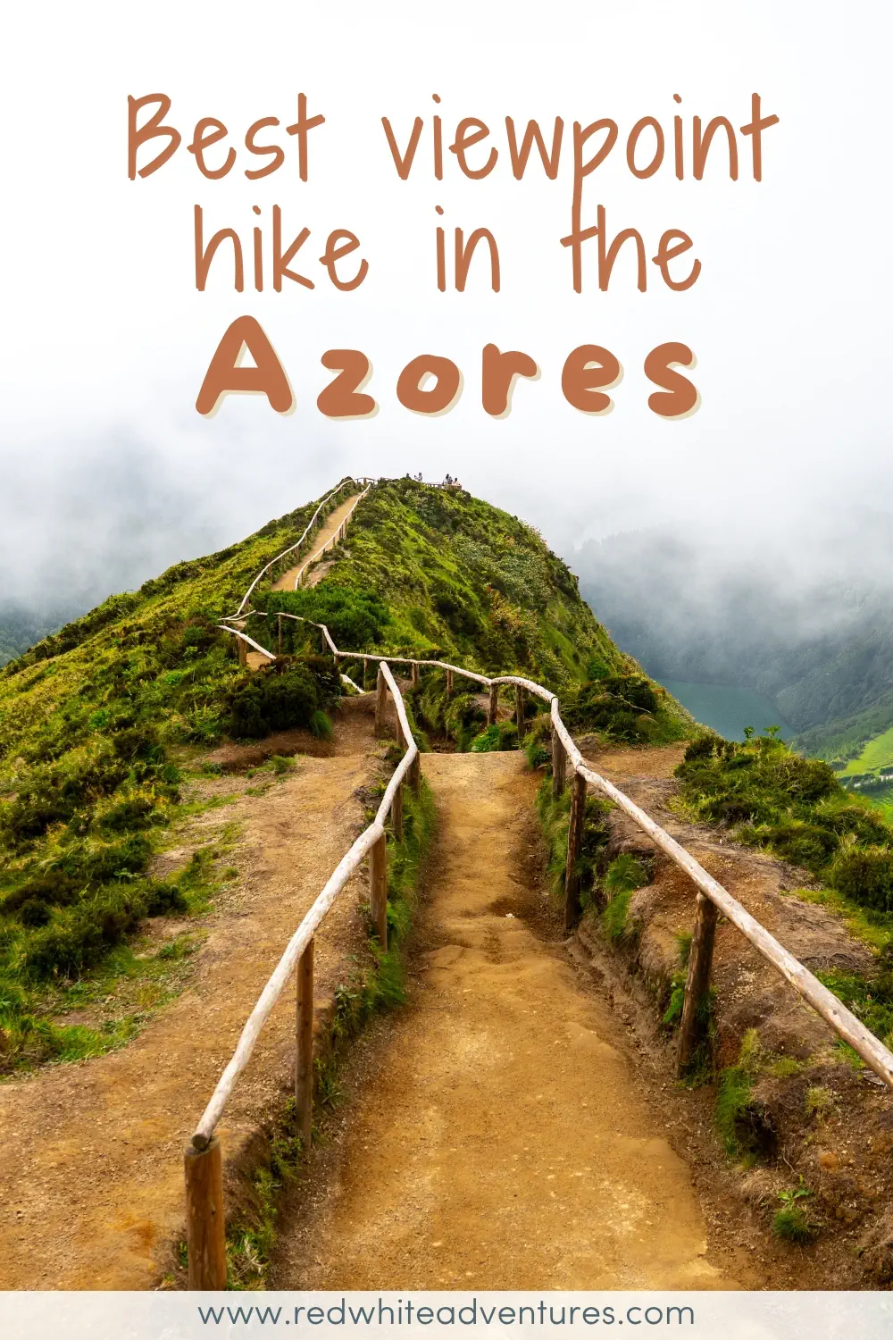 A narrow dirt trail with wooden railings winds along a lush green ridge toward a misty viewpoint in the Azores. Text overlay reads "Best viewpoint hike in the Azores".