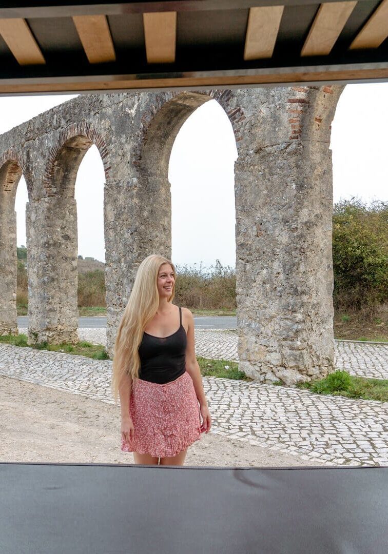 Photo of a girl camping in Obidos, Portugal.