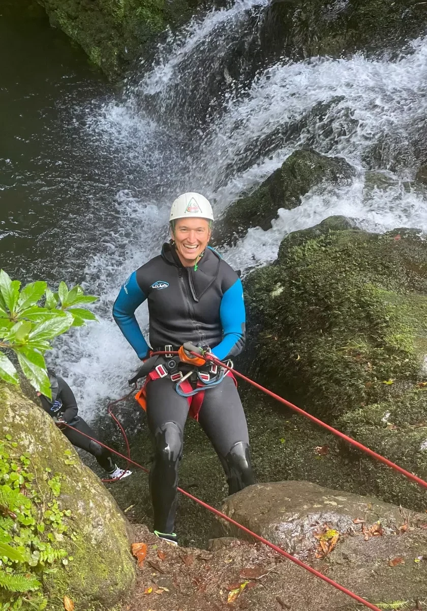 Dom posing for a photo while canyoning in Madeira.