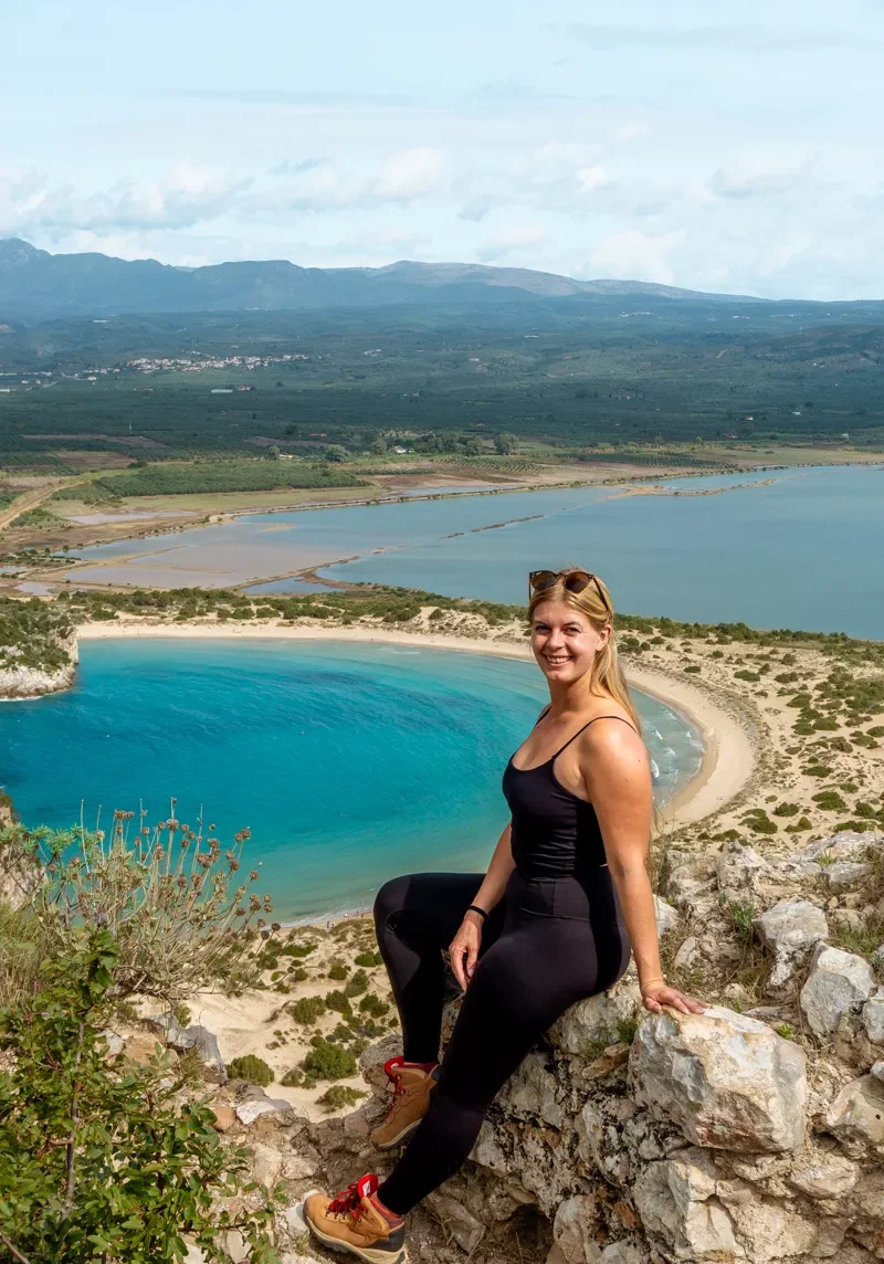 Jo posing for photo above the Voidokilia Beach.
