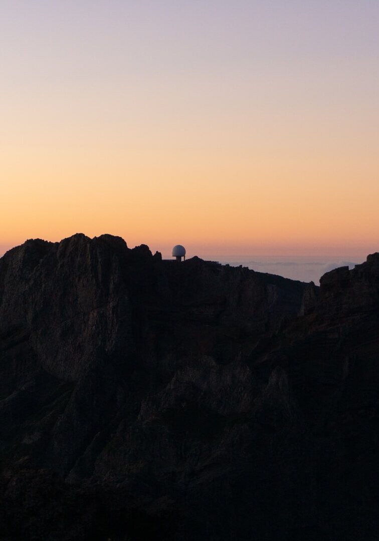 Sunrise coming up with the Madeira mountains in front.