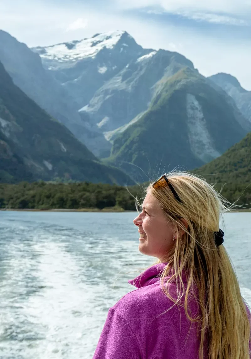 Jo enjoying the view from a boat tour out on Milford Sound.