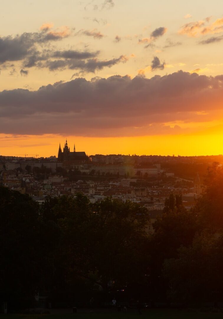 The sunset from Riegrovy Sady. You can see the sun setting behind the Prague Castle