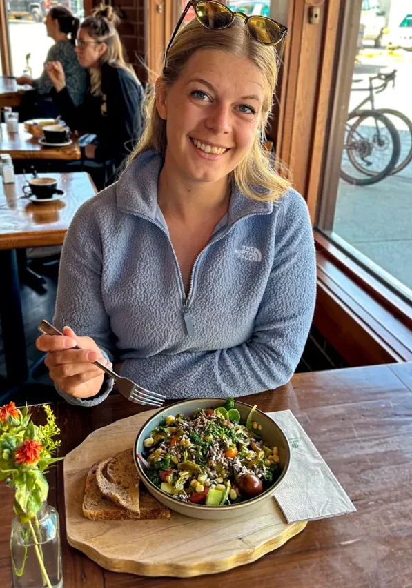 Jo eating a delicious meal at Terra Firmas Kitchen and Cafe in Revelstoke!