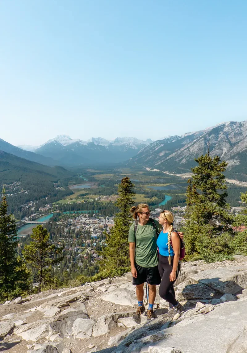 Dom and Jo posing for a picture from the top of Tunnel Mountain.